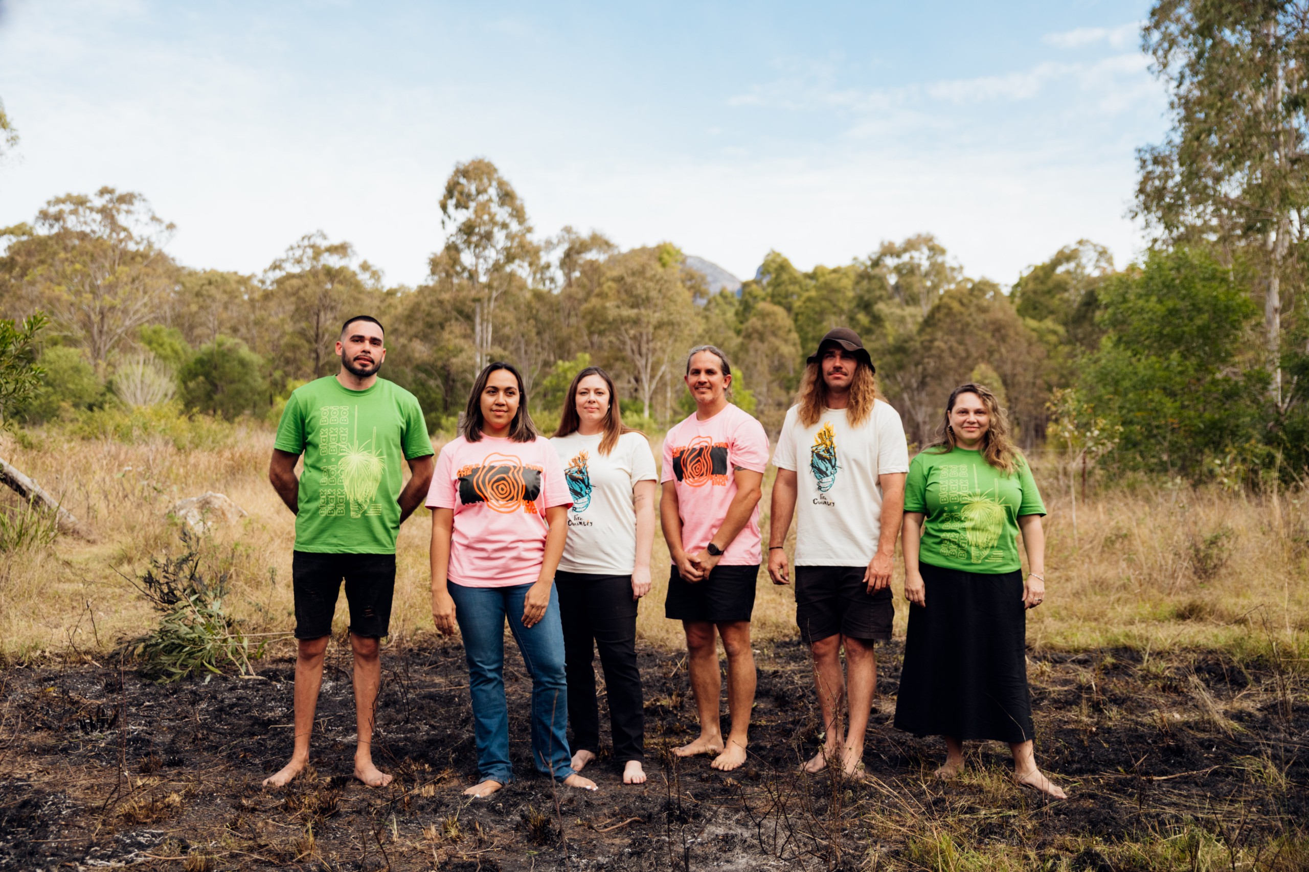 Group stands in Firesticks x Magpie Goose Tees